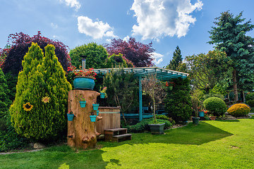 Image showing Beautiful pergola in summer garden