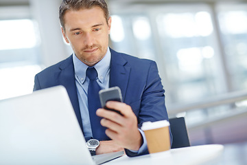 Image showing Thinking, corporate or business man with phone in office for communication, social networking or content blog review. Laptop or manager with smartphone for social media, mobile or web app search