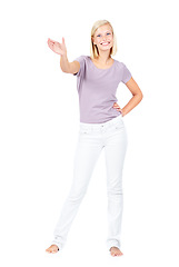 Image showing Portrait of woman and hand holding space for product placement, branding or bottle design in studio. Model with empty product for marketing or advertising mockup in hand isolated on white background