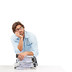 Image showing Burnout, stress and businessman with stack of paperwork on desk for deadline, corporate project and report. Ideas, vision and tired employee thinking with pile of files, papers and documents on desk