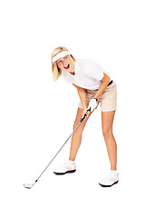 Image showing Woman, golf and stick ready for sports game, match or fun golfing against a white studio background. Happy blond female golfer isolated in sport with golf club screaming in frustration after shot