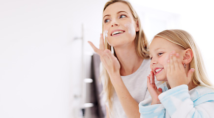 Image showing Skincare, mother and girl with cream, for natural beauty and bonding together in bathroom. Mama, daughter or child being happy, smile for cosmetics, organic facial and lotion for smooth skin and glow