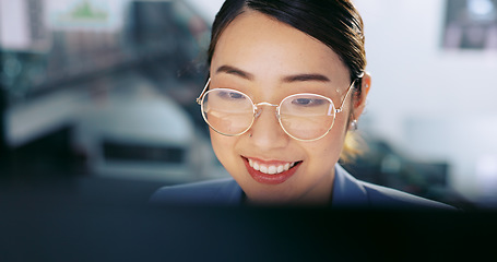 Image showing Business woman, face and work at computer, typing report or proposal for overtime, smile and deadline with kpi target. Online, connect and happy Asian worker with professional success and corporate.