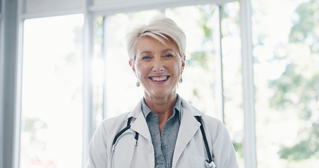 Image showing Face, senior woman and doctor for healthcare, wellness or medicine. Mature female, portrait or medical professional with smile, leader or confident with uniform, stethoscope or motivation in hospital