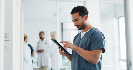 Image showing Doctor, tablet and research or planning schedule for healthcare, online medical consultation or search website. Asian man, nurse and reading report or patient analysis on tech device in hospital