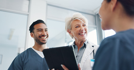 Image showing Doctor, team and tablet in discussion with senior for healthcare training, advise or support at hospital. Medical professionals with touchscreen in conversation, collaboration or teamwork at clinic