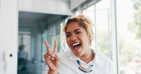 Image showing Business woman, peace sign and hands while making a funny face for fun with a positive mindset, happiness and cool attitude at work. Face portrait of a young employee showing hand for motivation