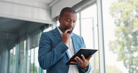 Image showing Thinking business black man with tablet for corporate review, strategy and idea for finance, budget and stock market in office building. Focus, data analytics and executive businessman on digital app