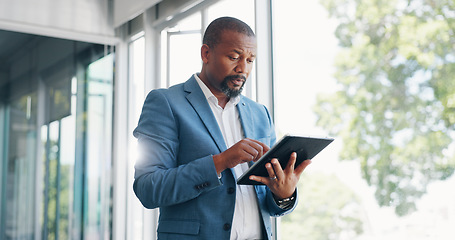 Image showing Business man, tablet and thinking in office lobby while browsing internet, social media or researching. Technology, idea and black man with digital touchscreen for web scrolling, networking or email.