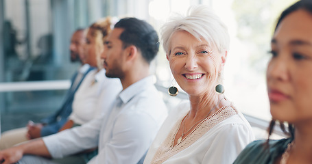 Image showing Face of a business woman in a meeting with people for office motivation, success and planning at a corporate company. Executive, ceo or worker smile in portrait at a workshop, seminar or conference