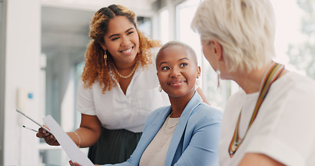 Image showing Documents, team work or business women in a meeting working on kpi data analytics or financial budget of a company. Portfolio, question or senior manager helping or talking to employee with paperwork