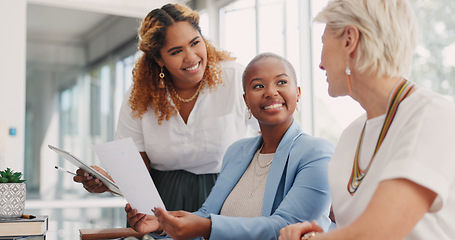 Image showing Documents, teamwork and business women planning, brainstorming and discussion in office. Paperwork, strategy and group collaboration of business people discussing sales, marketing or advertising data