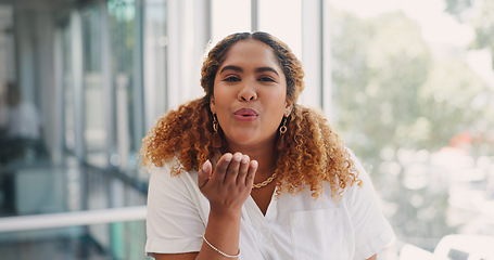 Image showing Office, face and happy woman blowing a kiss while working on a creative, marketing or advertising project. Creativity, happiness and professional female employee from Mexico flirting in her workplace