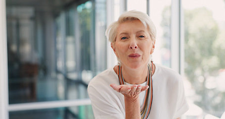 Image showing Happy, blowing kiss and face of business woman in office for management, leadership or confident. Professional, executive and smile with portrait of ceo in startup agency for mindset, career or flirt