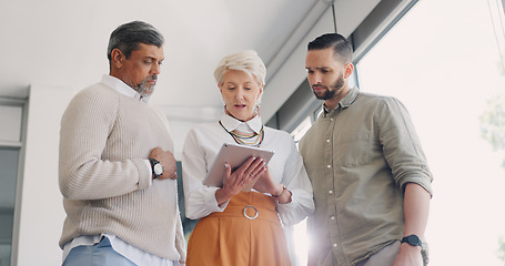 Image showing Digital tablet, planning and business people in discussion on corporate project management in the office. Teamwork, collaboration and team analyzing a document or report together on a mobile device.