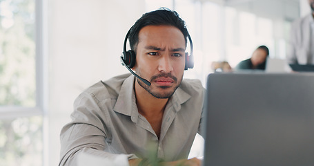 Image showing Telemarketing, tired and call center agent working on pc, online phone call and overworked crm contact us consultant. Asian man, stress headache and customer service consultation fatigue or burnout
