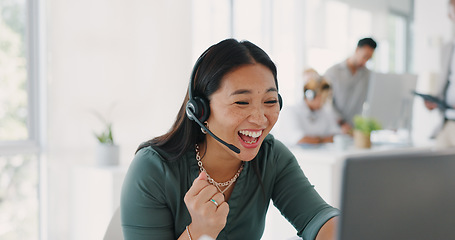 Image showing Happy, winner and success of woman at call center with good feedback on telemarketing sale. Smile, celebration and victory fist of asian girl at corporate telesales company with job win.