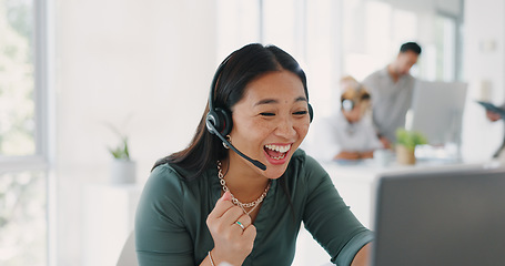 Image showing Happy, winner and success of woman at call center with good feedback on telemarketing sale. Smile, celebration and victory fist of asian girl at corporate telesales company with job win.