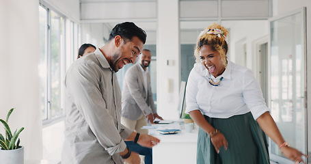 Image showing Business people, dance in office and celebration for financial success, achievement and end of the year fun. Man, woman and dancing together, groovy and team building for startup company or workplace