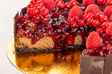 Image showing Chocolate cake with cherry jelly