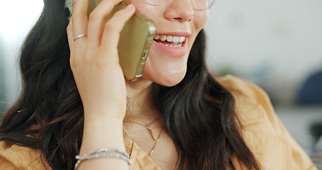 Image showing Phone communication, talking and asian woman at home on a sofa with a online conversation. Phone call, speaking and networking of a person on a mobile phone at a living room house on a couch