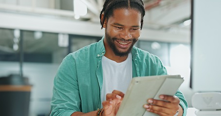 Image showing Tablet, business and black man typing in office, social media or research. Break, technology and happy male employee holding digital touchscreen for networking, internet browsing or web scrolling.