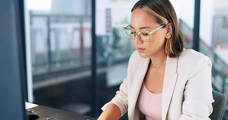 Image showing Computer, office and business woman with email marketing strategy, company seo review and social media management with focus. Asian corporate worker on desktop copywriting for website or newsletter