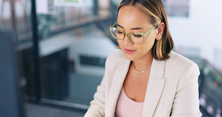 Image showing Asian woman, business or computer planning, typing or digital marketing research, data analytics or creative strategy in advertising agency. Happy worker working on desktop pc in trendy modern office