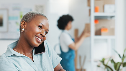 Image showing Black, businesswoman and phone call in logistics startup consulting with customer while working at office. Happy African female talking to client or buyer on smartphone in small ecommerce business