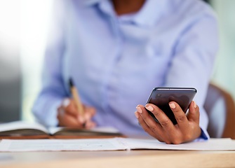 Image showing Hands, phone or writing in notebook for financial data, company budget or insurance accounting in business office. Zoom, black woman or mobile technology for finance worker, tax schedule or fintech