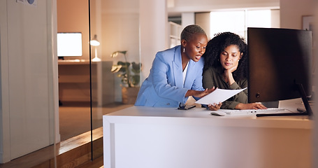 Image showing Business woman coaching worker at night modern office, planning documents research and company strategy. Female team employees working overtime on report collaboration, idea analysis and conversation