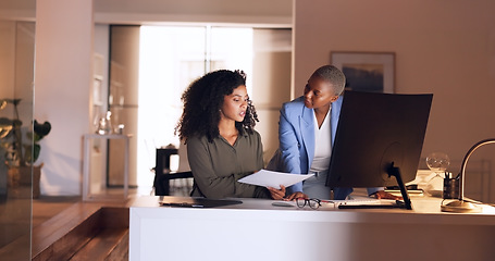 Image showing Business women, planning and night discussion of documents, paperwork and data report for kpi research, strategy analytics and economy analysis. Female employees computer collaboration in dark office