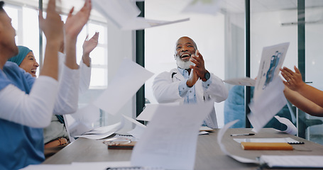 Image showing High five, applause and doctors throw paper in celebration of goals, targets or achievements. Meeting, teamwork and group of people or nurses throwing documents and clapping to celebrate success.