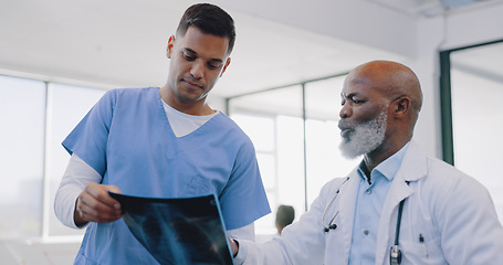 Image showing Doctor, nurse and xray with men and health consultation, advice and help with healthcare discussion and cardiology. Medical talk, hospital and team with collaboration and surgery with cardio surgeon.