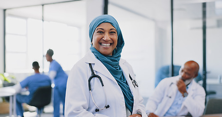 Image showing Face, Islamic woman and doctor with smile, hospital and confidence for surgery, consulting and smile. Muslim female, lady and medical professional for healthcare, consultant and surgeon in clinic.