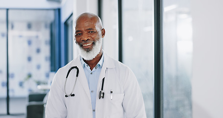Image showing Healthcare, doctor and face of black man in hospital, health facility and clinic for trust, support and help. Insurance, medical care and portrait of senior medical worker with smile for consulting