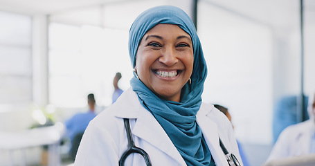 Image showing Tablet, healthcare and happy muslim woman doctor in hospital for telehealth, medical research or management in Indonesia . Portrait of smile surgeon in hijab, digital technology or clinic information