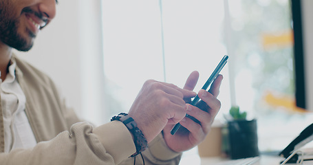 Image showing Creative businessman, hands and phone in zoom for social media, communication or browsing at office desk. Happy male employee typing in online search and smile for text, post or startup on smartphone