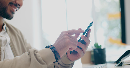 Image showing Creative businessman, hands and phone in zoom for social media, communication or browsing at office desk. Happy male employee typing in online search and smile for text, post or startup on smartphone