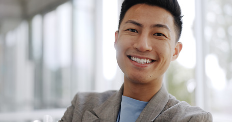 Image showing Singapore, leadership or portrait of a businessman with a smile in office of a startup company. Happy, motivation or manager for target mindset, goal or success with his arms crossed in workspace.