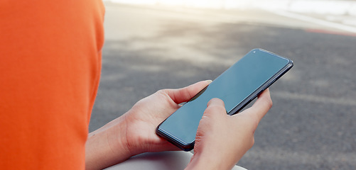 Image showing Fitness, smartphone in hands and mockup with green screen, black woman and app for exercise. Sports marketing, wellness and phone with virtual workout class.