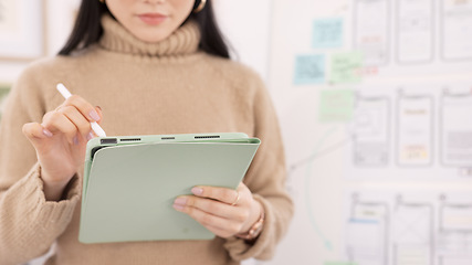 Image showing Woman, tablet and ui ux design with the developer being creative for mobile app project with a pen in office. Female planning, web design and development of wireframe on storyboard for website idea