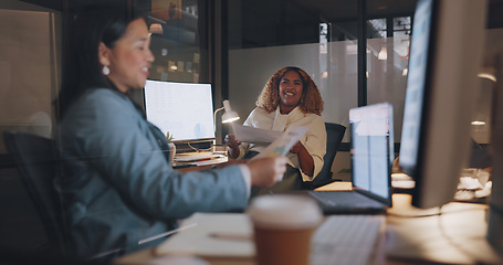 Image showing Business women, documents and collaboration with partnership and paperwork, working together in office. Partner, conversation and planning with paper, coworking at desk and computer, online and help.