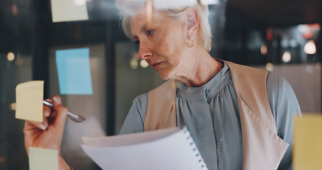 Image showing Planning, CEO or woman writing on sticky note for development project or brainstorming creative ideas. Focus, data analysis or company manager working on marketing goals or branding strategy at night