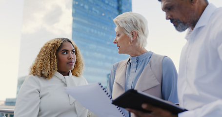 Image showing Leadership, senior or business people networking on rooftop in city talking or planning a digital marketing strategy. Teamwork, CEO or employees in meeting speaking of kpi goals or sales growth ideas