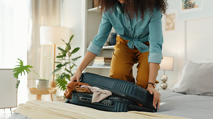 Image showing Travel, vacation and black woman packing suitcase in bedroom for adventure destination. Woman in hotel, international journey and clothes in bag before airport trip and freedom to explore the world.