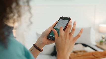 Image showing Woman hands, phone and travel website or social media scroll of a person booking a vacation. Holiday research ui, online and planning on a mobile in a bedroom on the internet at home reading a blog