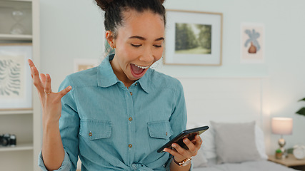 Image showing Excited woman, phone and notification at home while happy with wow reaction for winning competition, goal or challenge online. Female in bedroom reading message or chat for results or score for game