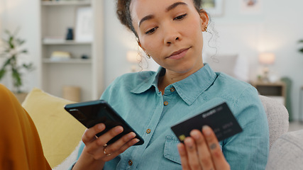 Image showing Phone, credit card and finance with woman on sofa for payment, online shopping and investment. Savings, budget and ecommerce with girl customer in living room at home for banking, sale and fintech