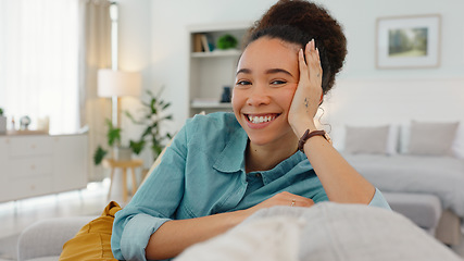 Image showing Woman, sofa and face with smile, thinking and happy idea in home, living room or apartment. Black woman, couch and relax in lounge, house and daydream with vision, goal or happiness in Los Angeles